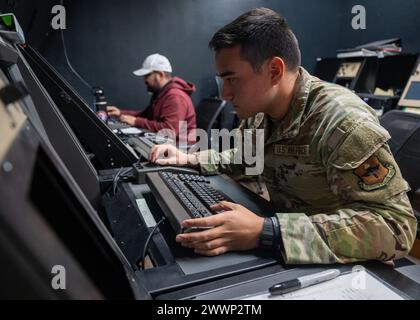 U.S. Air Force Airman Johnathan Beriker, 47th Operational Support Squadron air traffic controller (ATC) apprentice, practices on an air traffic control simulator at Laughlin Air Force Base, Texas, Feb. 12, 2024. Before ATCs can direct live aircraft, they practice on simulators, displaying proper control and knowledge to instructors. That control is important because RAPCON begins to get in contact with aircraft when they are about 60 miles away from Laughlin, providing information to pilots about where they should fly to stay safe.  Air Force Stock Photo