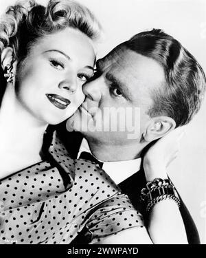 VIRGINIA MAYO and JAMES CAGNEY Publicity Portrait in WHITE HEAT 1949 director RAOUL WALSH screenplay Ivan Goff and Ben Roberts suggested by a story by Virginia Kellogg music Max Steiner Warner Bros. Stock Photo