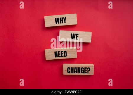 Why we need change words written on wooden blocks with red background. Conceptual symbol. Copy space. Stock Photo