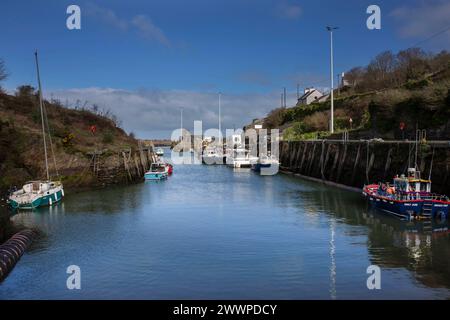 Amlwch Harbour with fishing boats vessels moored. Amlwch Port, Anglesey, Wales, United Kingdom. 23rd March 2024 Stock Photo