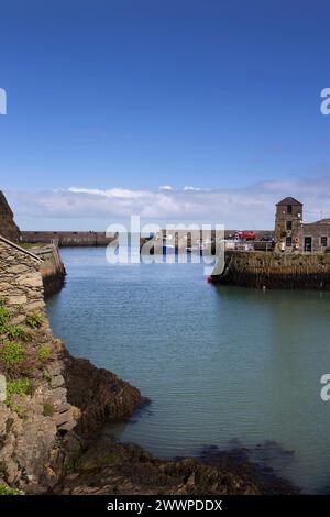 Amlwch Harbour with fishing boats vessels moored. Amlwch Port, Anglesey, Wales, United Kingdom. 23rd March 2024 Stock Photo