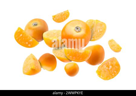 Ripe orange physalis fruits falling on white background Stock Photo