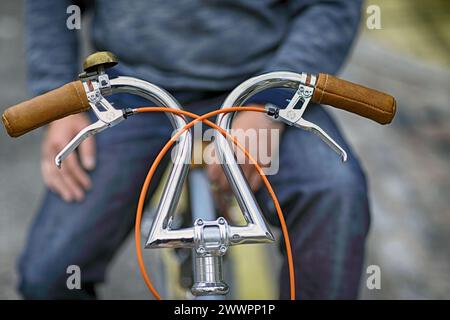 curved handlebar of custom lowrider bicycle Stock Photo