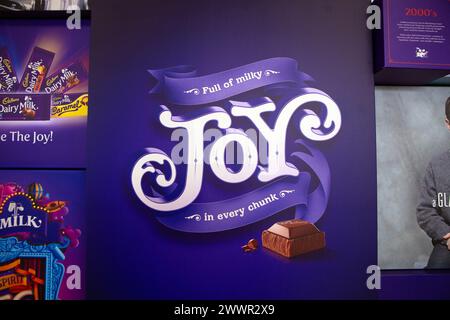 Vintage replica Cadbury's Dairy Milk Advertising signs of their chocolate products on display at the Cadbury's factory  and offices in Bournville, Bir Stock Photo