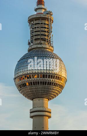 Berlin TV tower in detail. Sphere of the tallest building in the capital of Germany. Glass front of the ball from the TV tower at evening in sunshine Stock Photo