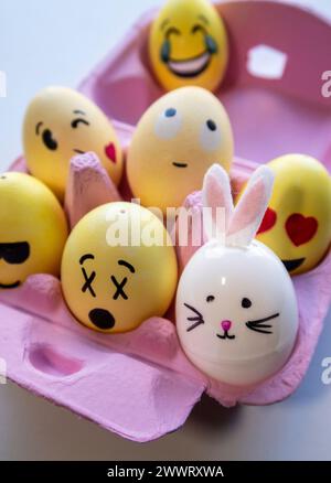 Pastel Egg Carton ofHand Decorated Easter Eggs and Bunnies, USA, 2024 Stock Photo