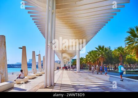 MALAGA, SPAIN - SEPT 28, 2019: The Palm Grove of Surprises promenade, stretching along Malaga Port, Malaga, Spain Stock Photo
