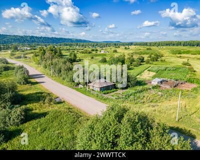 Searching for camouflaged enemy firing points in populated areas using light unmanned aerial vehicles, aerial view Stock Photo