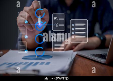 Businessman checklist report marketing task application online and questionnaire information, database document management, digital technology process Stock Photo