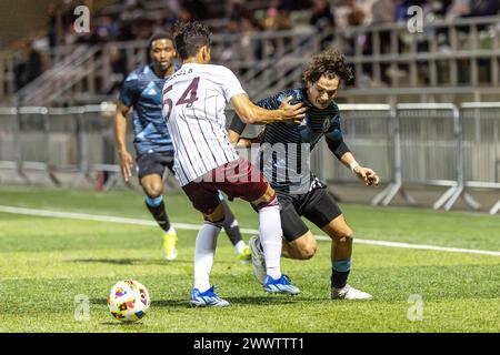 Twquilla, Washington, USA. 24th Mar, 2024. Colorado Rapids player #54 comes in and blocks the ball on Tacoma Defiance player SEBASTIAN GOMEZ #90, in the 2nd half of the game, Tacoma Defiance vs Colorado Rapids, with a game ending score of 4-2 on 3-24-22. (Credit Image: © Melissa Levin/ZUMA Press Wire) EDITORIAL USAGE ONLY! Not for Commercial USAGE! Stock Photo