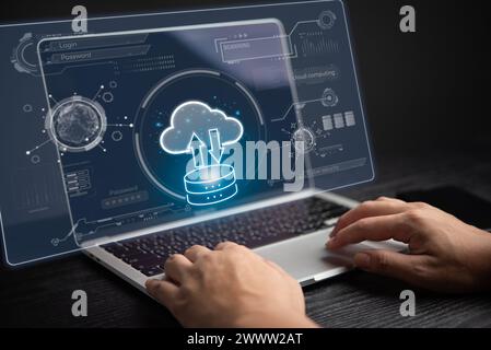 Personal cybersecurity with cloud storage technology, data backup, and privacy login passwords, internet online network. Businessman using computer la Stock Photo