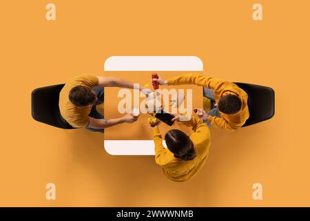 Creative collage. Aerial view of young people, colleagues eating fast food against yellow background. Copy space. Stock Photo