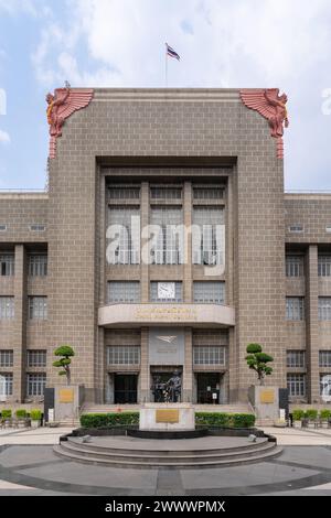 Vertical view of facade and entrance of ancient General Post Office aka Grand Postal Building with garuda or khrut reliefs Stock Photo