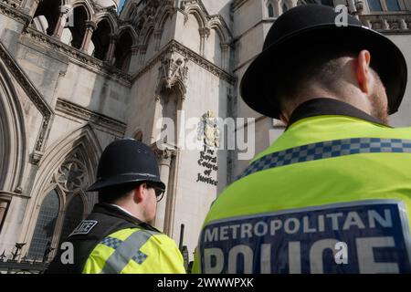 London, England, UK. 26th Mar, 2024. In the heart of London, a significant gathering is underway at the Royal Courts of Justice on Strand, where supporters of Julian Assange convene for the 'Protest to Defend a Free Press Decision Day.'' This event marks the final appeal decision concerning Assange's extradition case. The atmosphere is charged with anticipation as attendees, from various walks of life, unite in their call for press freedom and transparency. (Credit Image: © Joao Daniel Pereira/ZUMA Press Wire) EDITORIAL USAGE ONLY! Not for Commercial USAGE! Stock Photo