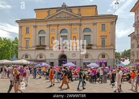 Lugano, Switzerland - June 14, 2019: Crowd of People in Front of City Hall at Summer Day. Stock Photo
