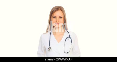 Portrait of happy friendly smiling young woman doctor with stethoscope posing on white studio background Stock Photo