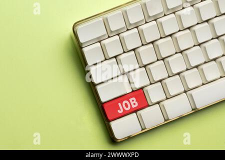 Keyboard button with the job text on a green background. Business, job, and career concept Stock Photo