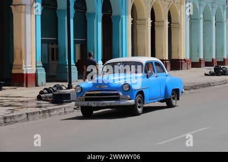 107 Old blue and white almendron car -yank tank, Chevrolet classic- from 1952 on the Paseo del Prado promenade. Old Havana-Cuba. Stock Photo