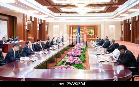 Beijing, China. 26th Mar, 2024. Zhao Leji, chairman of the National People's Congress Standing Committee, meets with Nauruan President David Adeang in Beijing, capital of China, March 26, 2024. Credit: Li Tao/Xinhua/Alamy Live News Stock Photo