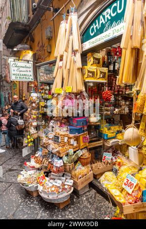 Naples, Italy - April 9, 2022: Traditional Italian pasta products displayed at the window of a local pasta shop in Naples, Campania, Italy. Stock Photo