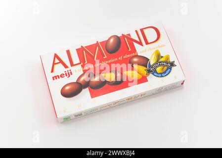 Fuji city, Shizuoka-ken, Japan - February 14, 2024: Almond chocolate box by Meiji brand sold in Japan. Isolated on white background in top view. Stock Photo