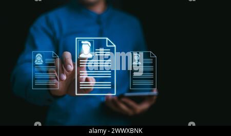 Personnel selection from the resume or outstanding performance from the application, Human resource department company constantly searching job candid Stock Photo