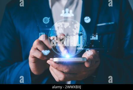 businessman holding Global network connection. Big data analytics and business intelligence concept. World map point and line composition concept of g Stock Photo