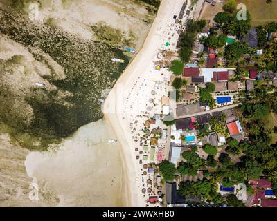 Aerial view of colorful sunshades on a tropical beach (Gili Air, Indonesia) Stock Photo