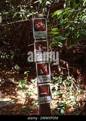 Everglades National Park, Florida, United States - May 4, 2013: Sign forbidding activities in the Gumbo Limbo Trail of the Royal Palma Visitor Center. Stock Photo