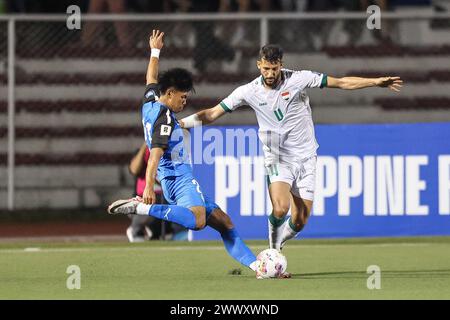 Manila, Philippines. 26th Mar, 2024. Suad Natiq Naji (R) of Iraq competes against Santiago Rublico of the Philippines during the group F match of 2026 FIFA World Cup Asian qualifiers between the Philippines and Iraq in Manila, the Philippines, March 26, 2024. Credit: Rouelle Umali/Xinhua/Alamy Live News Stock Photo