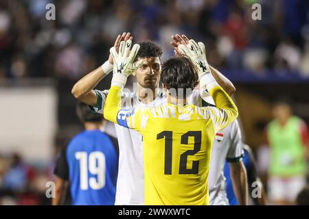 Manila, Philippines. 26th Mar, 2024. Goalkeeper Jalal Hassan (front) of Iraq celebrates with teammate after winning the group F match of 2026 FIFA World Cup Asian qualifiers between the Philippines and Iraq in Manila, the Philippines, March 26, 2024. Credit: Rouelle Umali/Xinhua/Alamy Live News Stock Photo