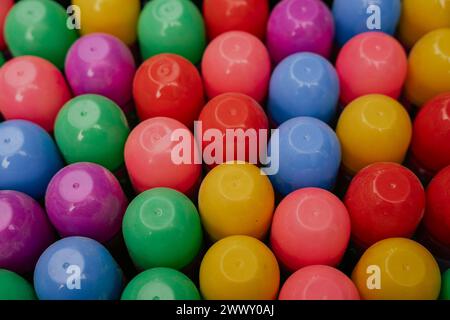 Vendor sells Holi celebration items in a street market, ahead of Holi festival on March 23, 2024 in Guwahati, Assam, India. Holi is the Hindu Stock Photo