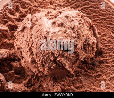 Structure of frozen chocolate ice cream close up. Ice cream background. Stock Photo