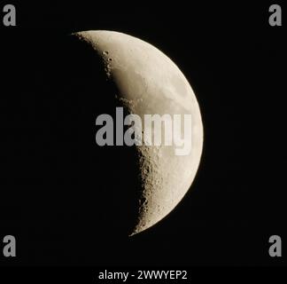 Photograph of Moon in the waxing crescent lunar phase. Stock Photo