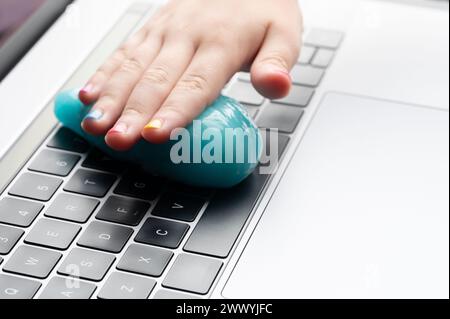 Gel cleaning keyboard buttons from small dust close up view Stock Photo