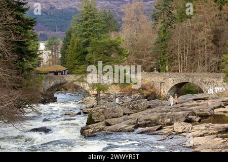 The Falls of Dochart are a cascade of waterfalls situated on the River Dochart at Killin in Perthshire, Scotland Stock Photo