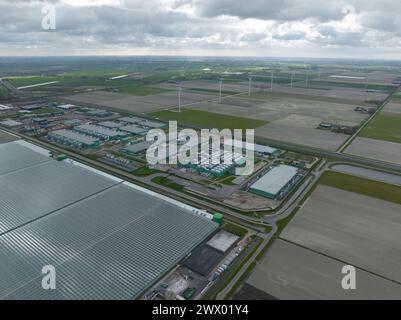 Data center, computing center facility business critical IT equipment servers housed. Artificial intelligence and internet infrastructure. Aerial Stock Photo