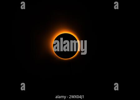 Eclipse recreation images done in a studio using a bright light and a round cap with a bit of atmospheric spray for, well, atmosphere. Stock Photo
