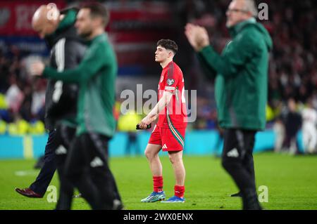 Wales' Dan James dejected after missing a penalty in the penalty shoot-out following the UEFA Euro 2024 Qualifying play-off final at Cardiff City Stadium, Cardiff. Picture date: Tuesday March 26, 2024. Stock Photo