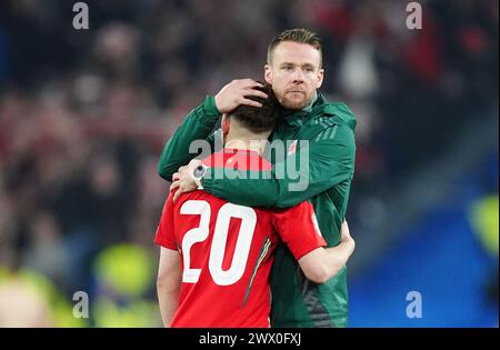 Wales' Dan James dejected after missing a penalty in the penalty shoot-out following the UEFA Euro 2024 Qualifying play-off final at Cardiff City Stadium, Cardiff. Picture date: Tuesday March 26, 2024. Stock Photo