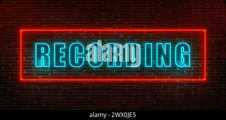 Recording, entertainment and show business. Recording sign. Brick wall at night with the word Recording in blue neon letters. Entertainment industry, Stock Photo