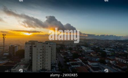 Sun and clouds with beautiful variation of colors and tones in the city of Suzano Stock Photo