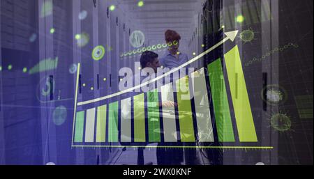 Covid-19 statistical data processing over male and female engineers working in computer server room. Covid-19 pandemic and business data storage techn Stock Photo