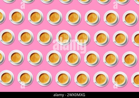 Seamless pattern a large group of coffee cups placed in a pop art repeated pattern against a pink background, a high-quality studio shot Stock Photo