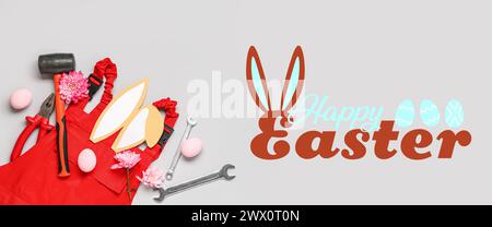 Festive banner for Happy Easter with construction tools and uniform Stock Photo