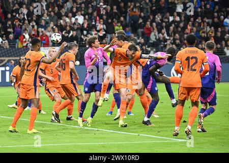 Frankfurt, Germany. 26th Mar, 2024. Players of Germany and the Netherlands head for the ball during a friendly match between Germany and the Netherlands in Frankfurt, Germany, March 26, 2024. Credit: Ulrich Hufnagel/Xinhua/Alamy Live News Stock Photo