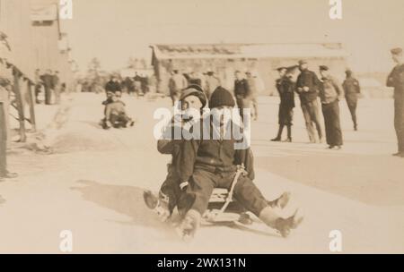 WAR PRISON BARRACKS NO. 1, FT. MCPHERSON, GA. Sledding party, sports during winter of 1917, at war prison camp Stock Photo