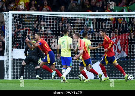 Madrid, Spain. 26th Mar, 2024. Spain's Rodrigo celebrates scoring during an international friendly football match between Spain and Brazil in Madrid, Spain, March 26, 2024. Credit: Gustavo Valiente/Xinhua/Alamy Live News Stock Photo