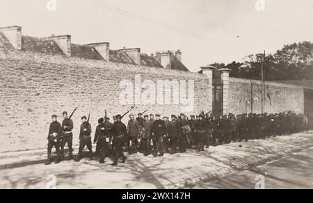 German prisoners of war being marched down a street in Brest, France ca. 1917-1919 Stock Photo