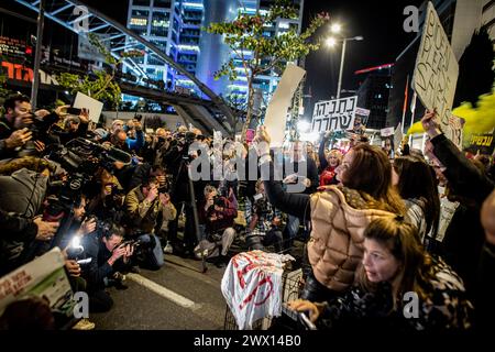 Tel Aviv, Israel. 26th Mar, 2024. Members of the press cover a protest calling on the government to reach a hostage release deal with Hamas. Israel on Tuesday recalled its negotiating team from Qatar after Hamas rejected its latest offer in talks on a hostage deal and truce. Credit: SOPA Images Limited/Alamy Live News Stock Photo